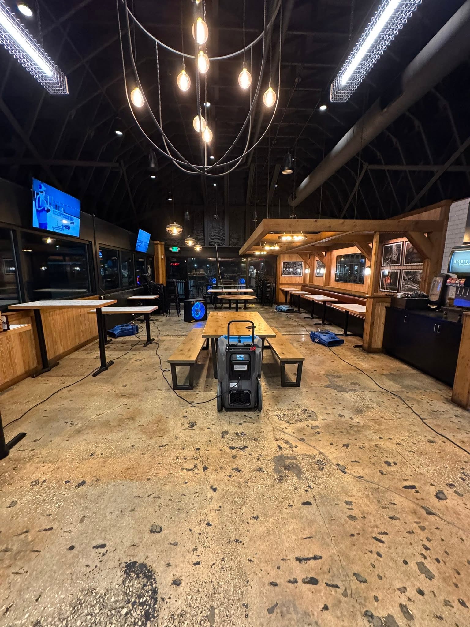 Air movers and drying equipment at a commercial Big Wave Restoration project